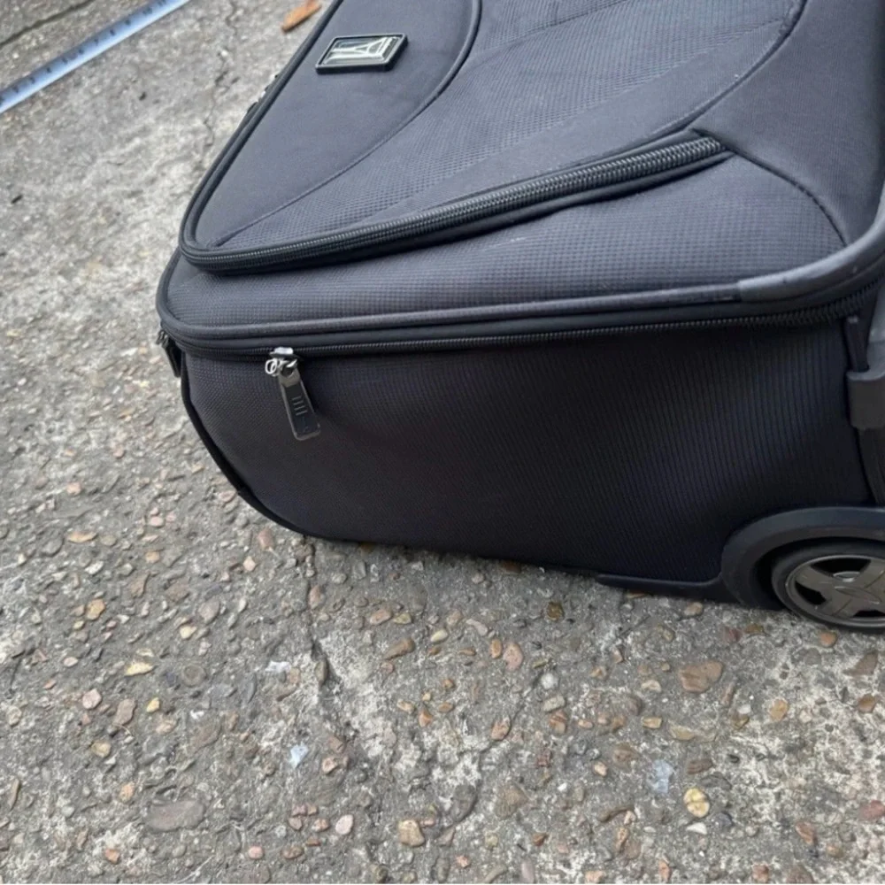 Travelpro Black Soft-Shell Rolling Under-seat Carry-On with Front Pocket